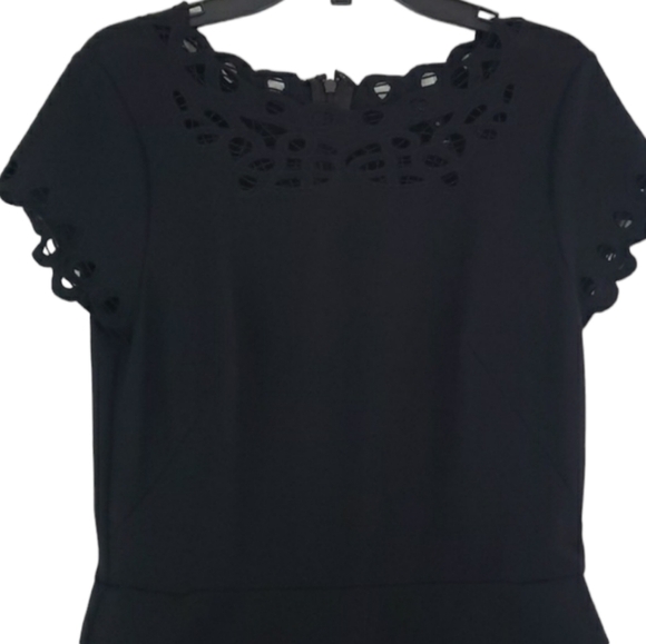 White Hause Black Market~Woman Size 0~Black Fit/Flare Lazer Cut Dress Pockets. - Picture 10 of 11